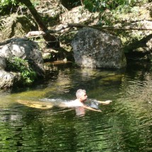 Alfred enjoying the cold water of jungle on a hot day